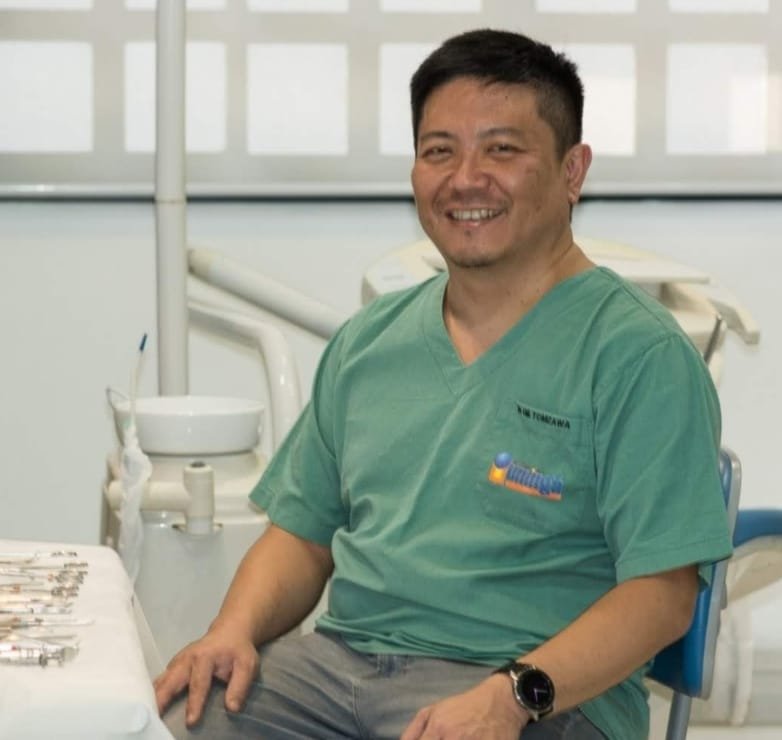 Retrato de Dr. Gil Tomizawa, Periodontia e Implantodontia na Clínica Vitaldent